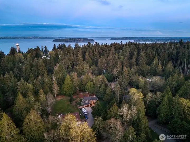 A twilight aerial view captures the property in its most inviting light.