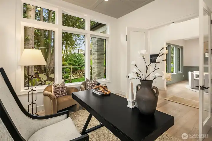 This room across the hall makes for a perfect home office, main level kids playroom or gym. So many options!