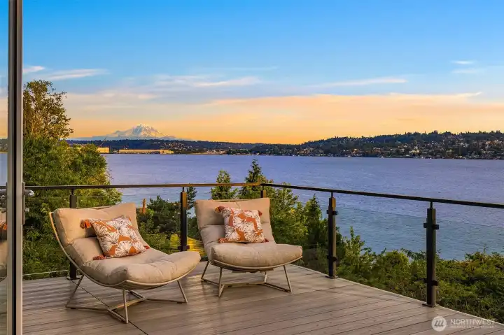Private view deck off the primary suite, offering a front-row seat to sweeping Lake Washington vistas and the majesty of Mount Raineir