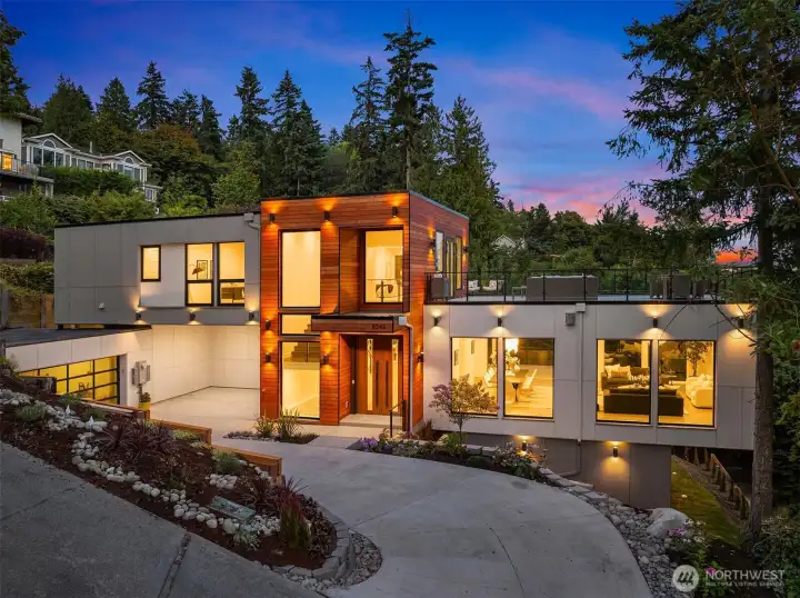 Striking modern architecture illuminated at dusk—an unforgettable first impression