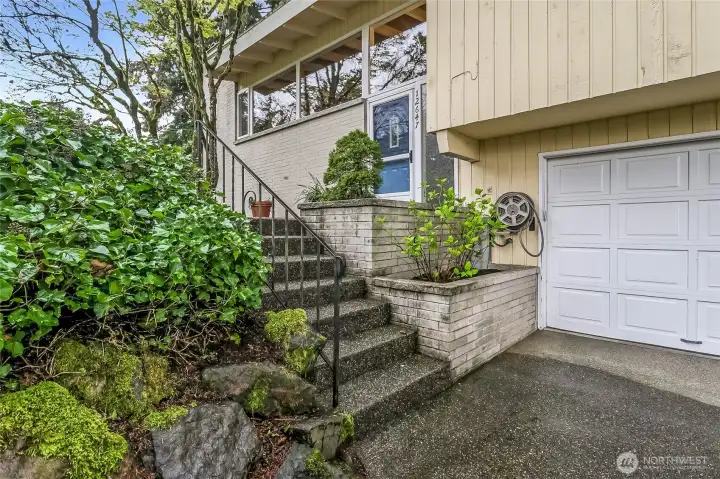 Bright and inviting front entrance with open patio.