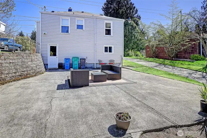 Large backyard patio creates a space for a variety of uses.