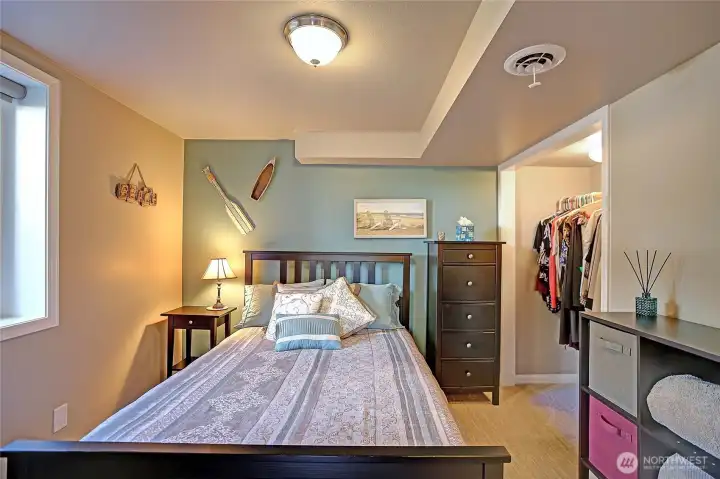 Downstairs guest bedroom is a private sanctuary.