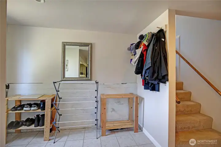 Nice versatile area just off the backdoor gives you additional space for storage and organizing.