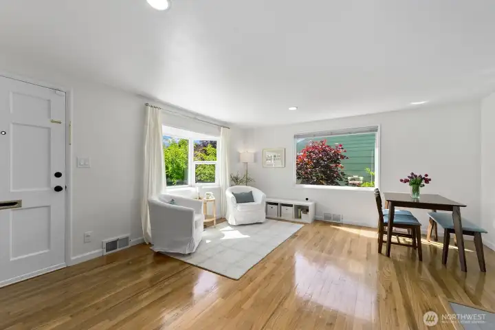 There are nice hardwood floors in the living and dining areas.