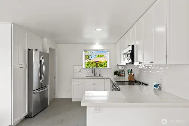 The kitchen was remodeled in 2024 and has new cabinets, countertops, appliances and reverse osmosis water.
