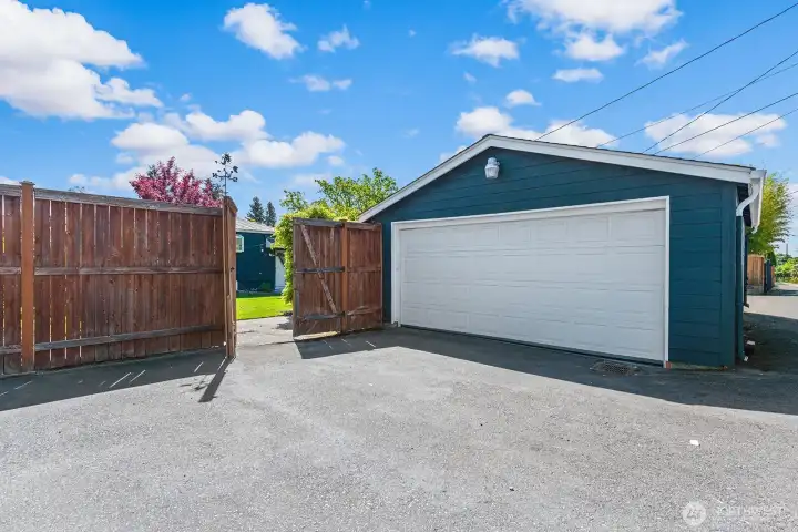 There's a large 2-car detached garage and additional parking off of the alley.