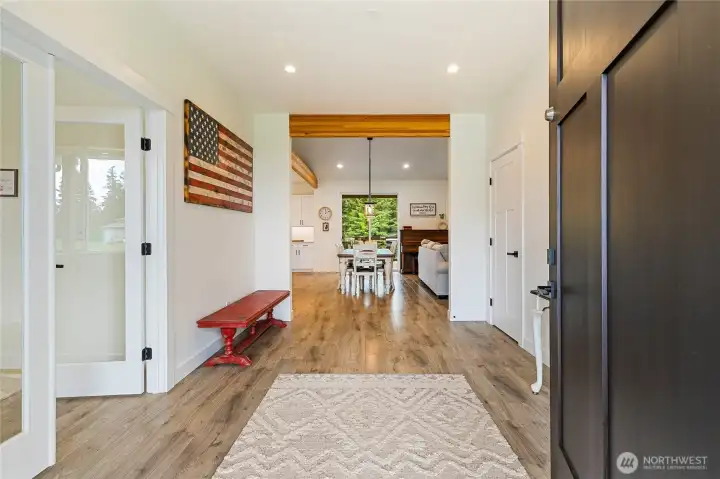 Step inside where you are greeted by a wide entry inviting you into this beautifully crafted custom home.