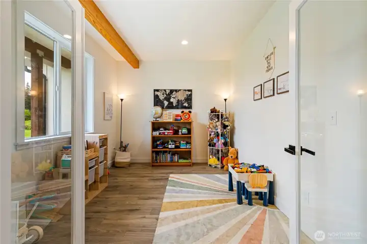 This office/den/play room is located just off the entryway.