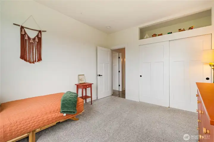 Bedroom #3 with extra open storage space.