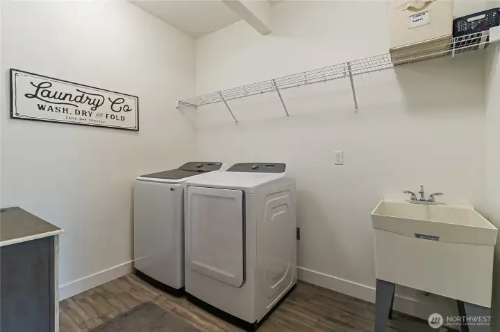 Laundry room off the mudroom even has a utility sink.