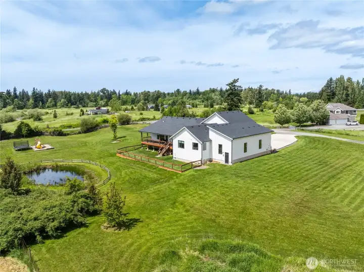 Great overhead view of property surrounding this custom retreat!