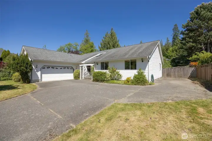 This home has great curb appeal...and a lot of off-street parking area. There is even room for an RV or a boat!