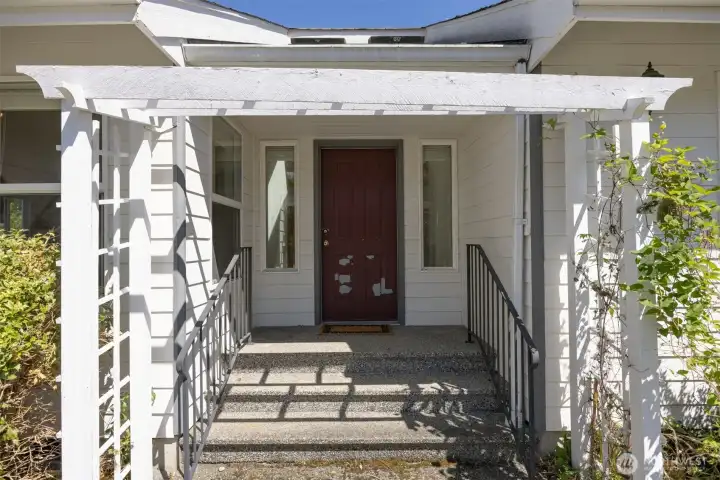 Welcome to 1608 Brook View Place...the entry is well defined, and the front door just needs a touch-up of paint!