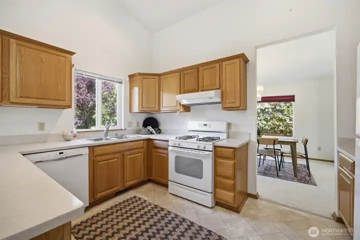 The kitchen is quite spacious and has a gas range.