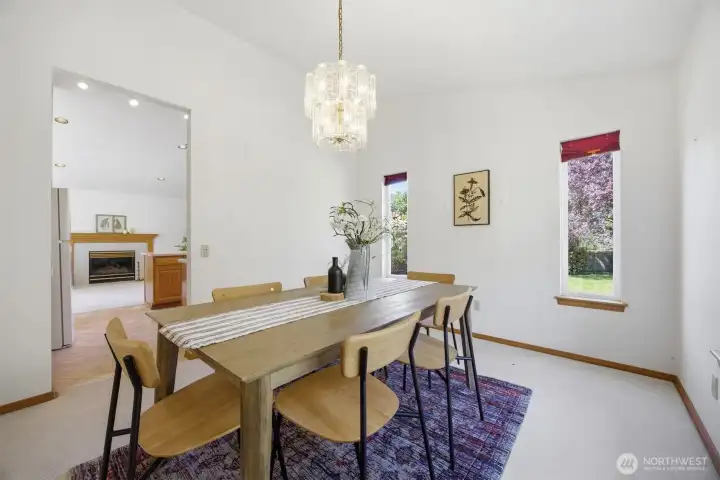The dining room is spacious and looks to the side and rear yards.