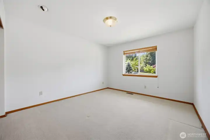 Third bedroom also takes in the front yard views with the cul-de-sac beyond.