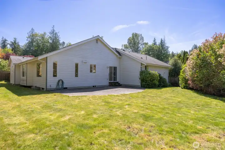 Looking at the rear and north side elevations of the home.
