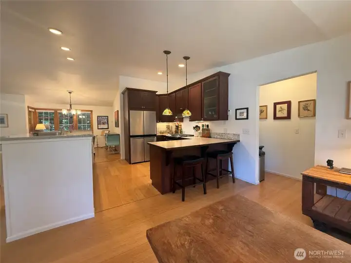 Warm bamboo flooring throughout great room. Warm bamboo flooring throughout great room.