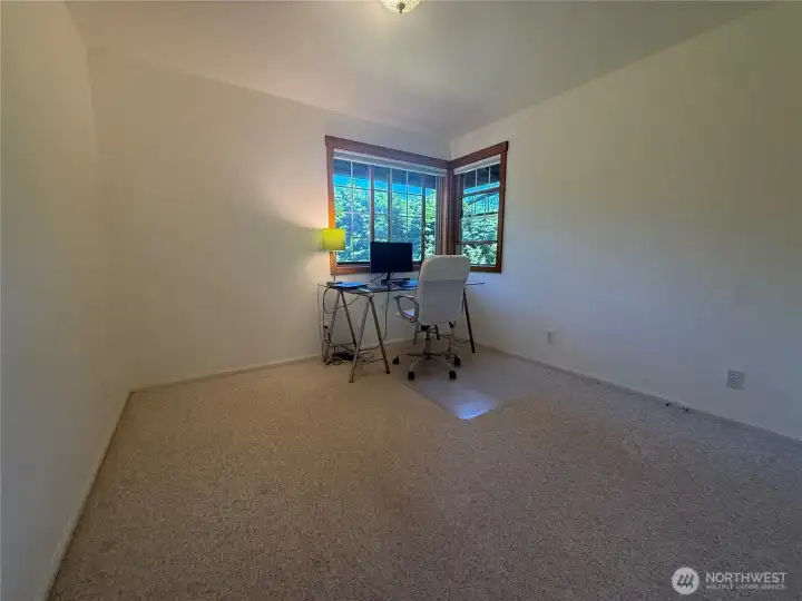 Another bedroom currently being used as an office. Lovely corner windows and large closets. Another bedroom currently being used as an office. Lovely corner windows and large closets.
