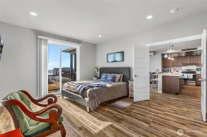 The main bedroom with doors that -- The main bedroom with doors that --