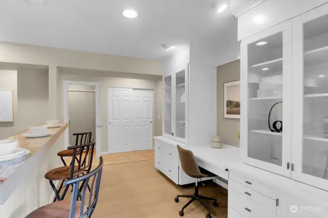 Custom built cabinetry with glass doors and storage, this exceptional space is perfect as a home office or study area. The drawer below the desk top pulls out for your keyboard. Engineered oak flooring is perfect for easy maintenance.