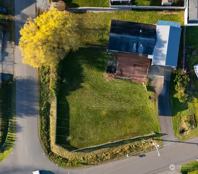 Looking down onto this double corner lot where Decatur and Orcas/Sinclair stop sign is.