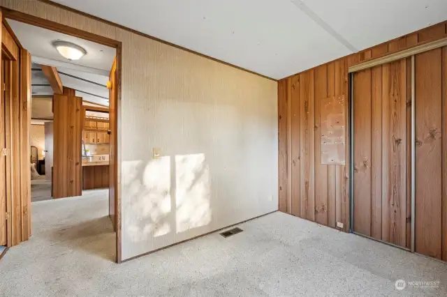 Looking toward the living area from the corner bedroom.