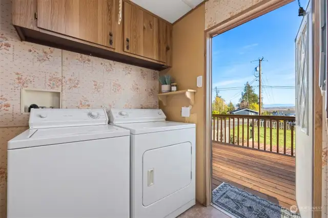 The  back door comes into the laundry room which is very convenient and there area incredible views while you do laundry, too!