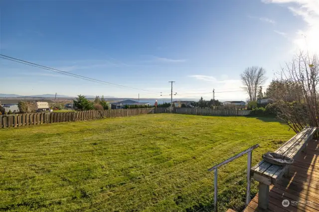 The views are expansive from the front deck and  the front lawn is fenced and huge!