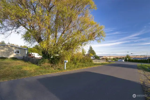 Looking at the home from the side street.