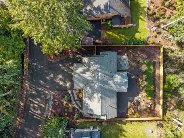 Backyard is fully fenced, and has easy-care landscaping.