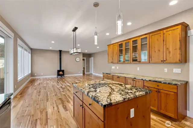 Propane fireplace warms this versatile great room.