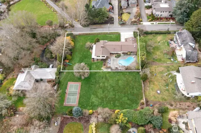 Property for sale does not include vacant lot directly to the east. The fence behind the pool (and extending that fence line to the south side of the yard) is the approximate lot line.