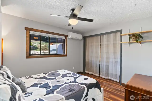 Guest bedroom #1 features a Murphy bed, a garden view, and its own mini split.