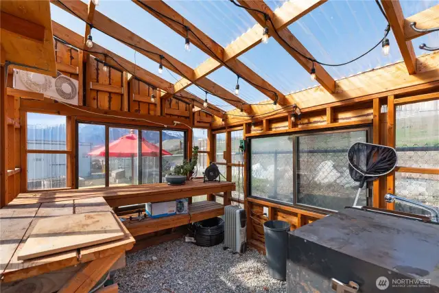 The greenhouse has power, water, vents (including openable windows), and feels so nice and warm inside!