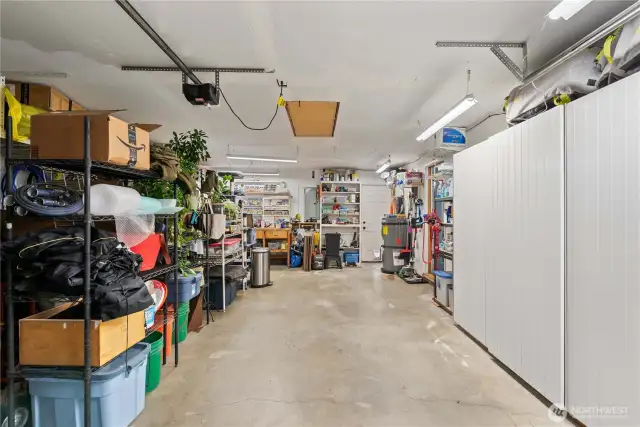 The shelving on the right stays, as does most of the other storage racks the buyer wants.  There is an exit door straight ahead, and to the right of that is the door to the kitchen.