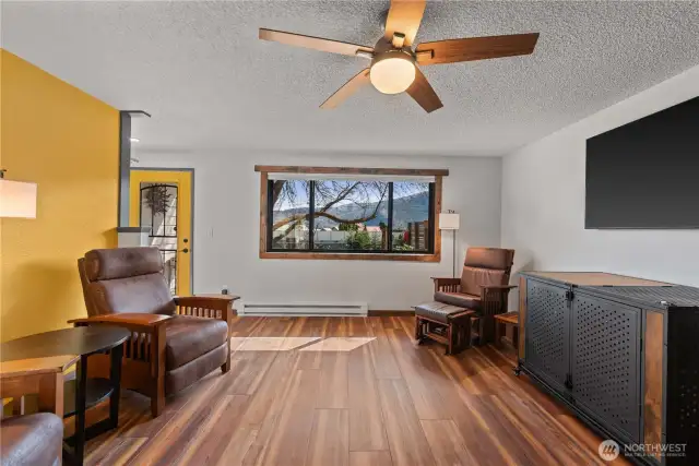 Step inside this renovated home.  That picture window lives true to it's name!