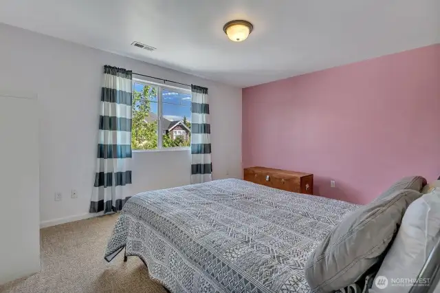 Light and bright third secondary bedroom