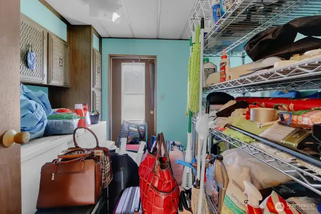 Utility room with washer and dryer