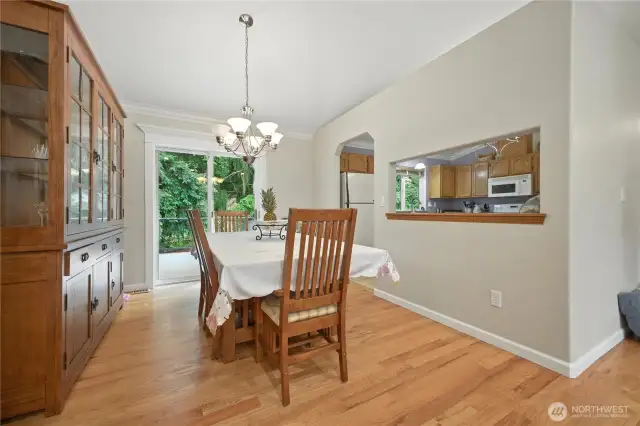 Kitchen overlooks dining room.