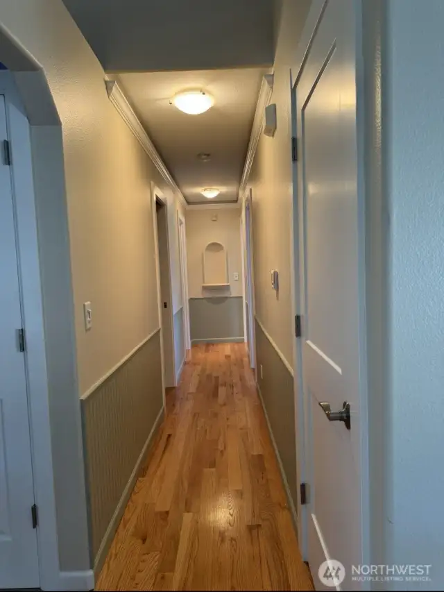 Hallway with crown custom lighting