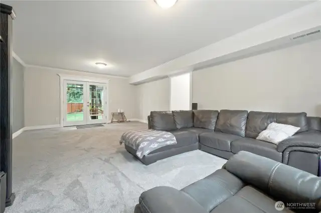 Another angle of the family room with fench doors to covered back patio