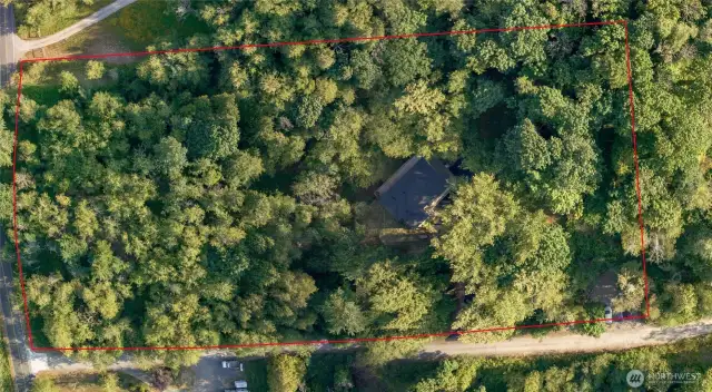 Gravel pit on the right corner of property line, can fit multiple cars or additional storage unit.