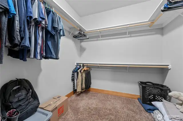 Primary bedroom walk-in closet