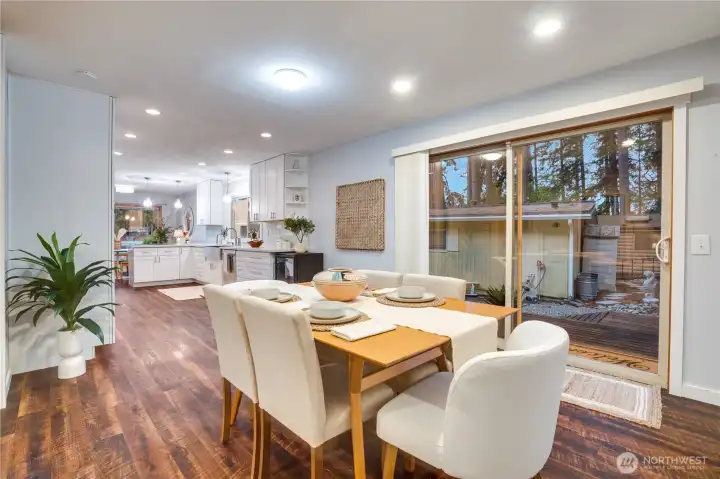 At the heart of the home, the updated kitchen dazzles with fresh appliances, stylish finishes, and plenty of cabinet space.