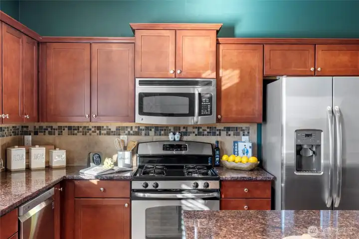 All appliances stay and you will love the gas stove.