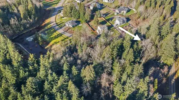 Shows the main road leading to Snohomish or Monroe and the large lot