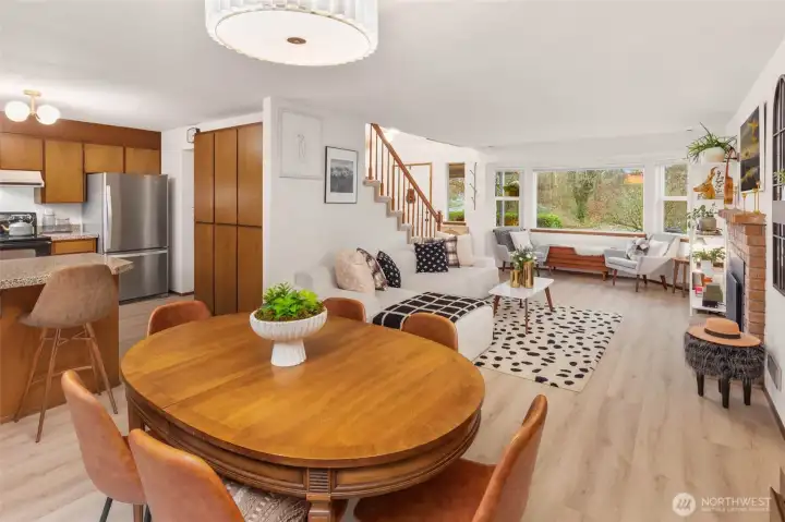 An open concept dining area between the family room and the kitchen.