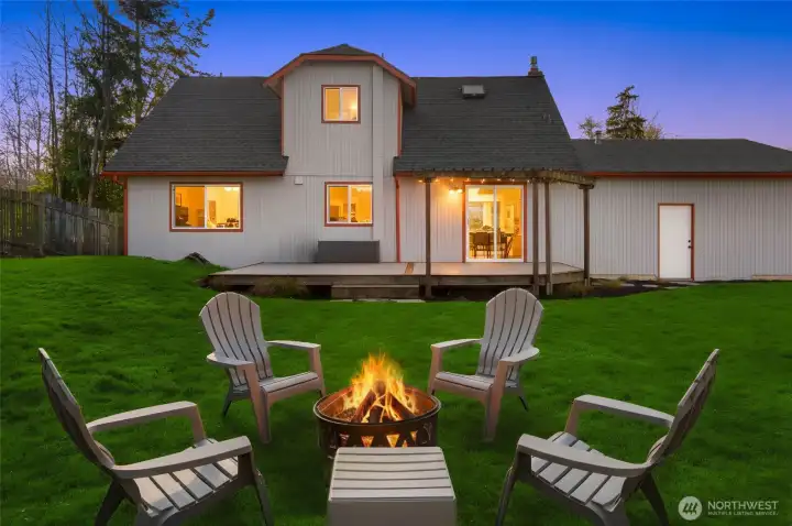 The backyard in twilight.